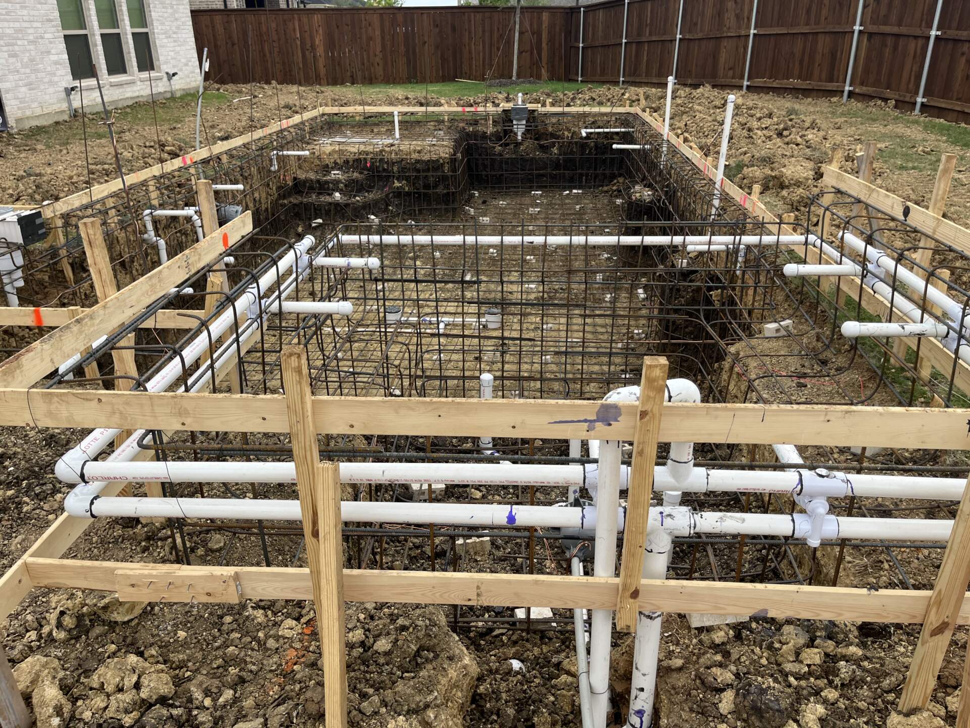 A picture of Step-by-Step Pool Build Process with Aqua Workz Pool